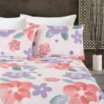 Juego de Sabanas estampadas color blanco con flores naranjas y moradas