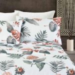 Juego de Sabanas estampadas color blanco con hojas y flores naranjas