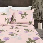 Juego de Sabanas estampadas color rosado  con hojas y flores lilas